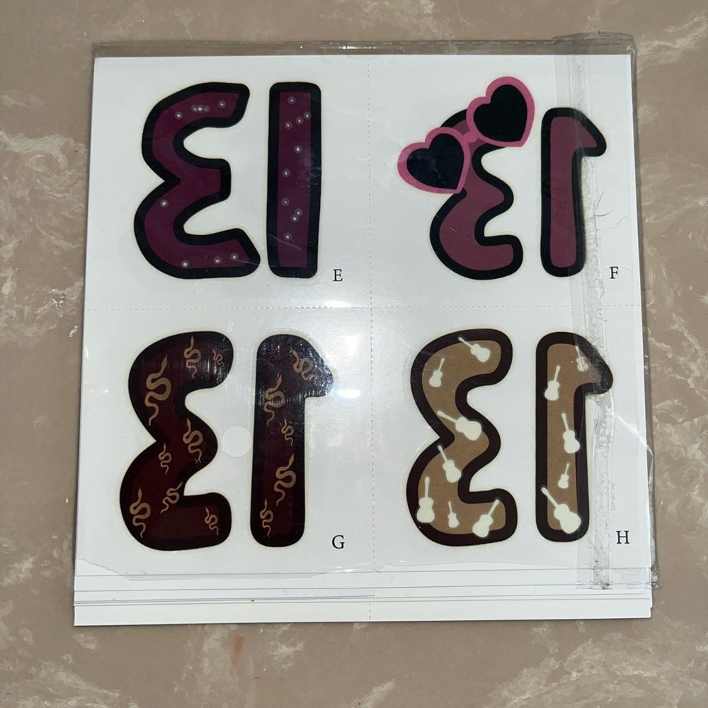 “13” temporary tattoos! Many included not just the 4 pictured